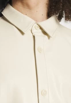 YOURTURN Unisex - Imitatieleren Jas - Beige -YOUR TURN Mode a32ba3b97fb84e7fae95b9c061124838